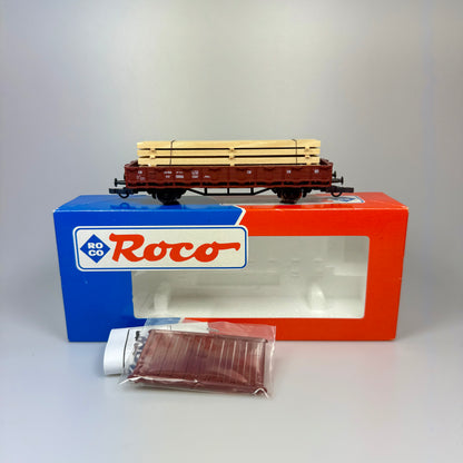 Roco Güterwagen mit Holzladung DB DC H0