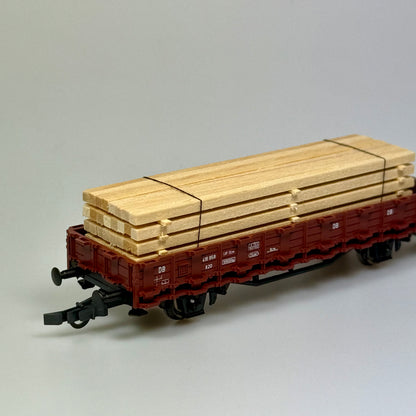 Roco Güterwagen mit Holzladung DB DC H0