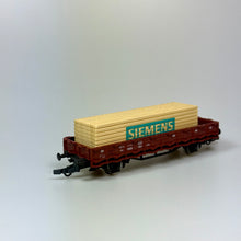 Roco Güterwagen mit Holzladung "Siemens" DB DC H0