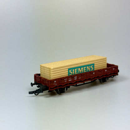 Roco Güterwagen mit Holzladung "Siemens" DB DC H0