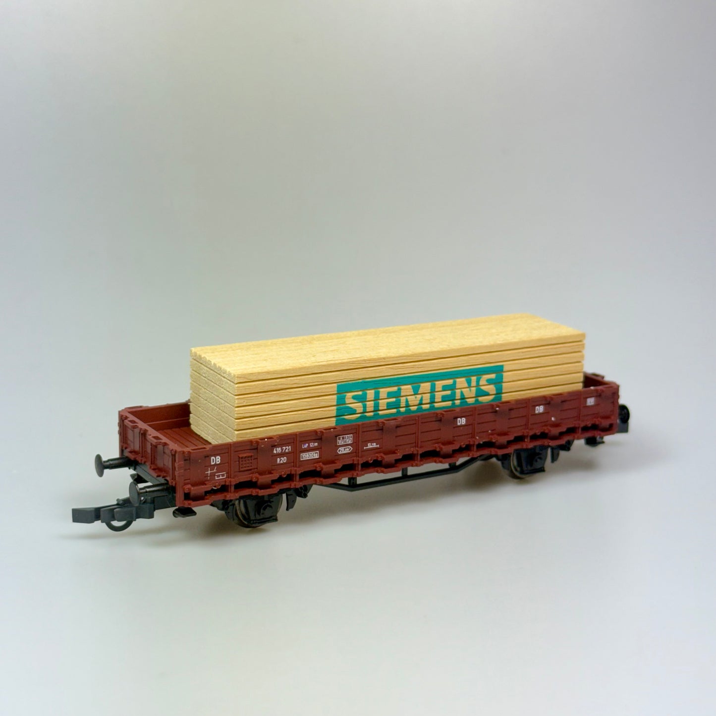 Roco Güterwagen mit Holzladung "Siemens" DB DC H0