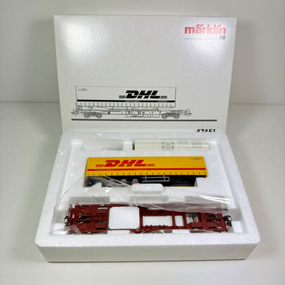 Märklin 47451 Taschenwagen mit Sattelanhänger "DHL" H0