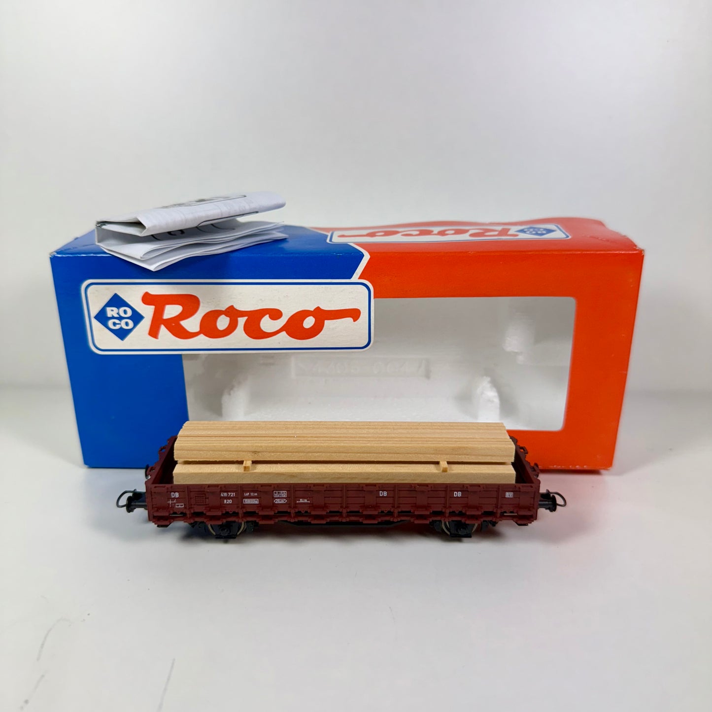 Roco 46031.C Niederbordwagen mit Holz DB DC H0