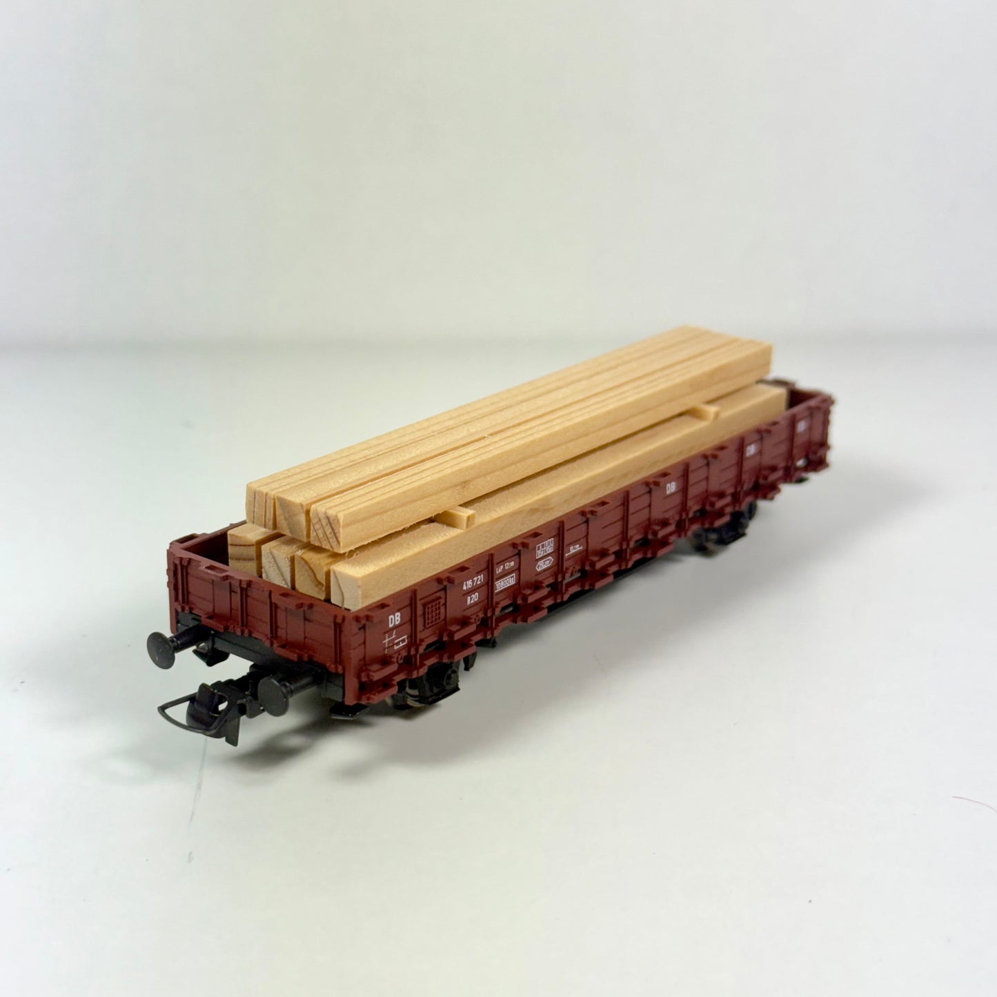 Roco 46031.C Niederbordwagen mit Holz DB DC H0